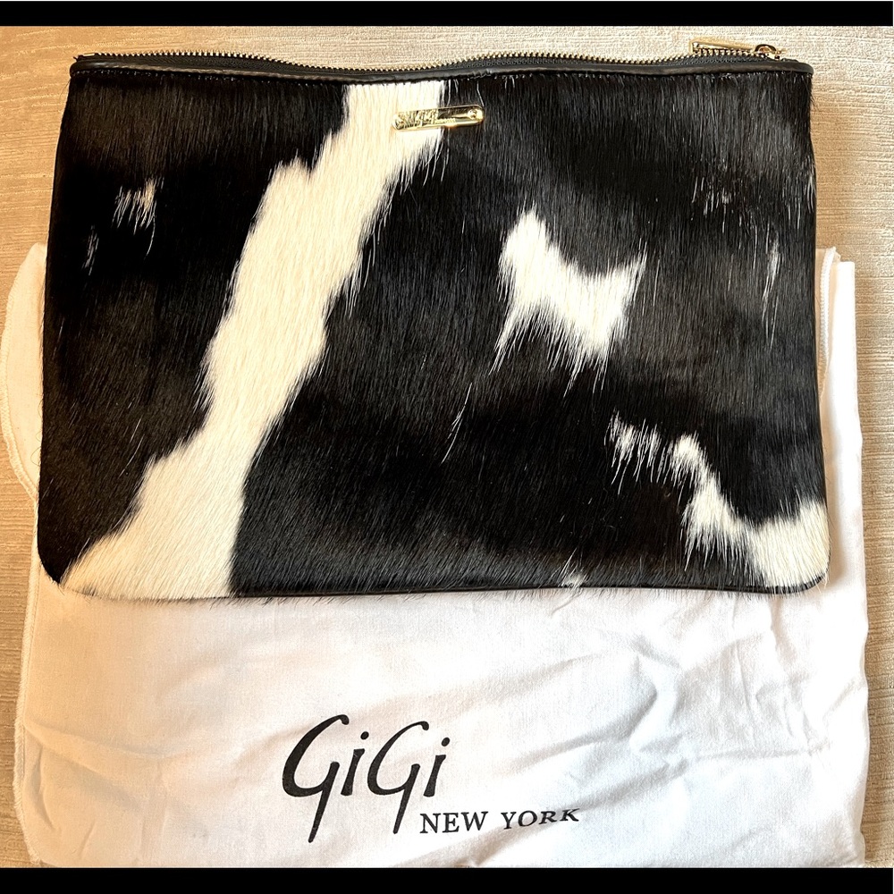 Gigi New York large zip calf hair clutch.